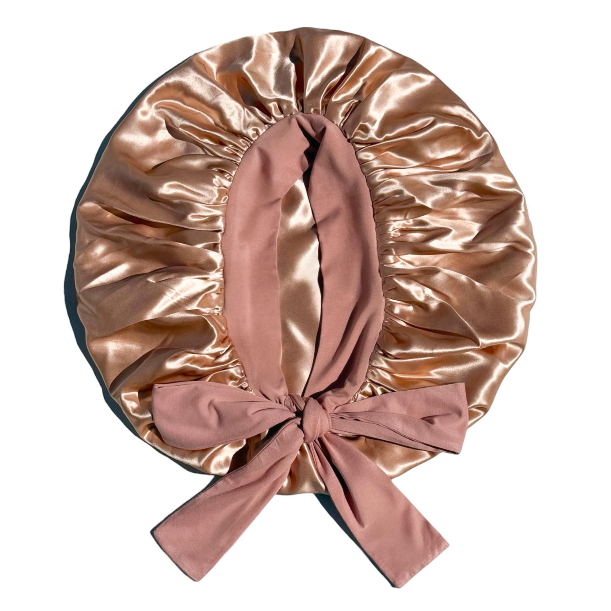 An extra large silk bonnet made with pure silk both inside and outside. Extra roomy bonnet for long and thick hair. A rose gold silk bonnet. A pink silk bonnet for healthier hair. 